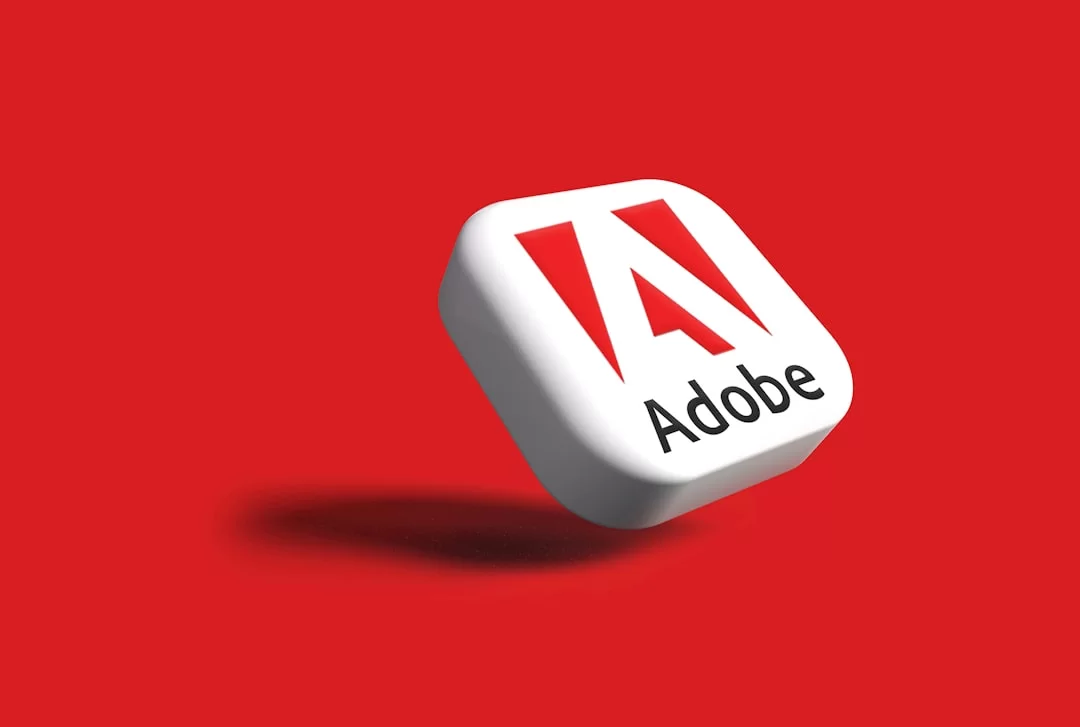An Adobe company logo on a red background
