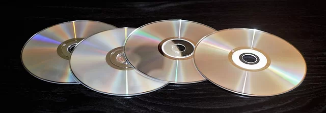 Four CDs lined up side by side