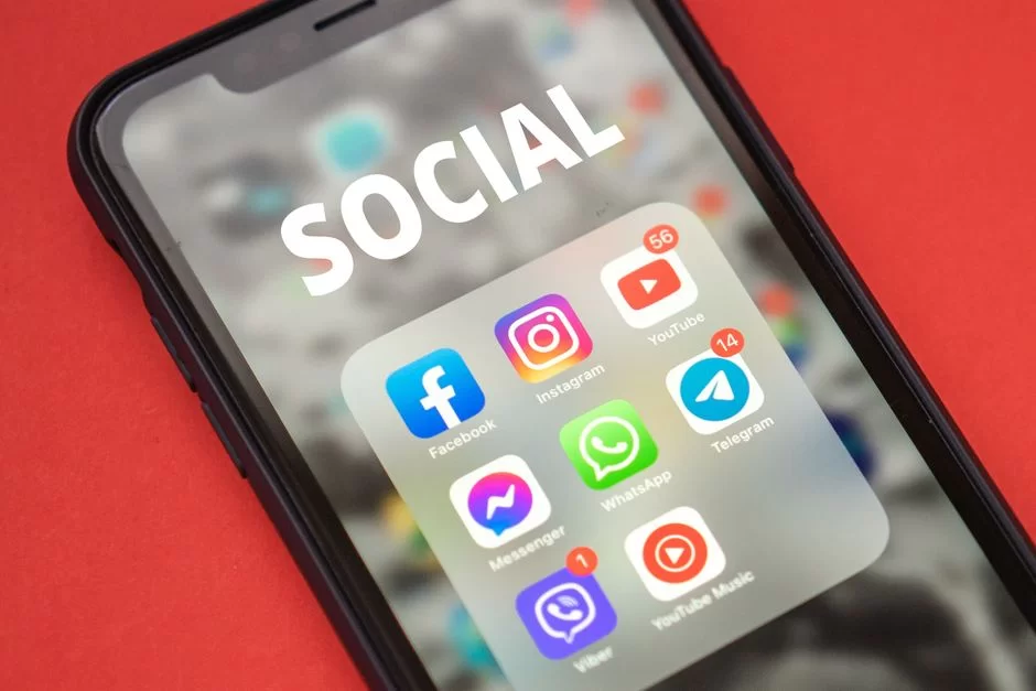 A mobile phone with Instagram, WhatsApp, and Telegram apps
