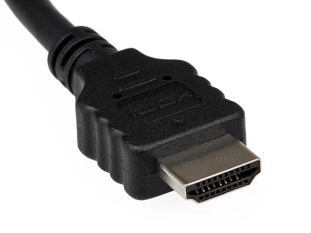 An HDMI cable with standard HDMI connectors on both ends that carries audio and video signals between devices