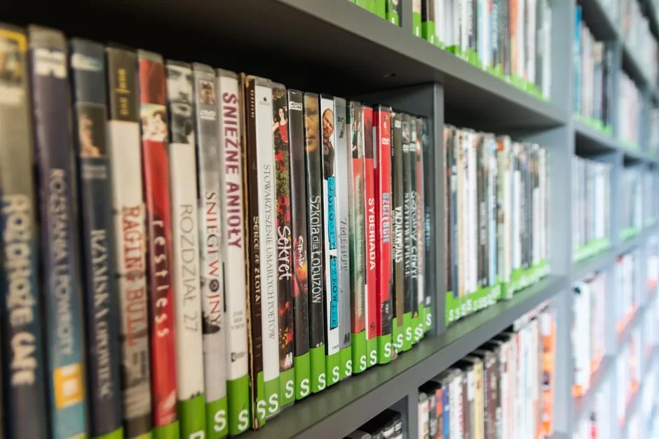 A side-shot photo of film series in a library cabinet