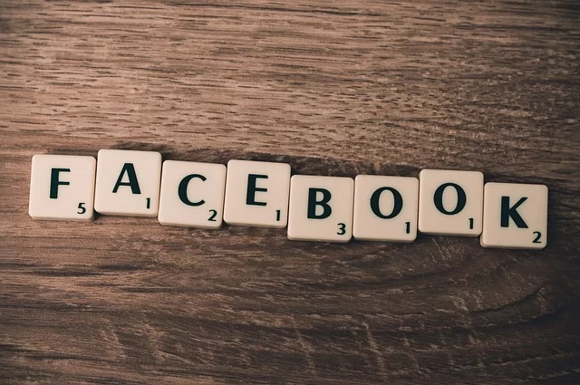 A visual of the term written with square tiles representing Facebook as a social media platform