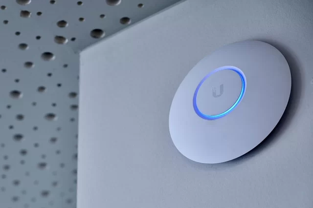A modern Wi-Fi router device with antennas providing wireless internet connection