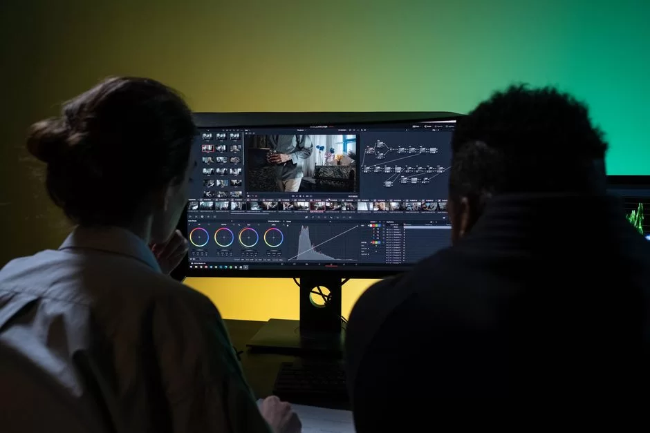 Image of two people comparing modern codecs like XviD